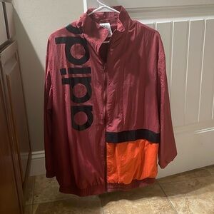 Large sized Addidas windbreaker in perfect condition.